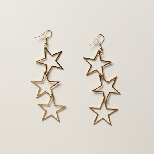 Pendientes estrellas silueta oro