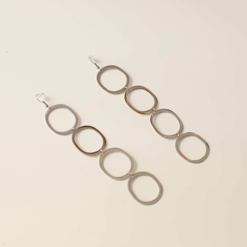 Pendientes circulares silueta plata