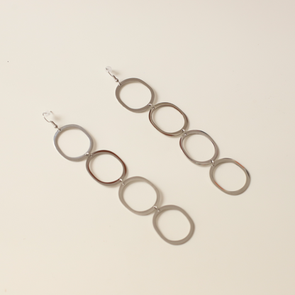 Pendientes circulares silueta plata